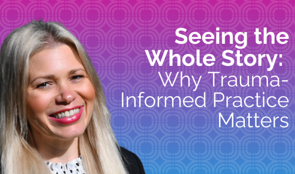 Jennifer Achari smiling on banner