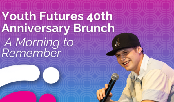 Boy with microphone on banner for 40th anniversary brunch
