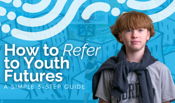 Young child in front of blue banner for referring people to youth futures