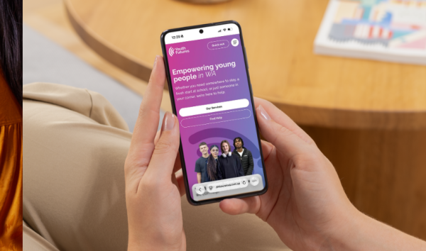 Young person accessing Youth Futures youth support services on mobile phone in Perth